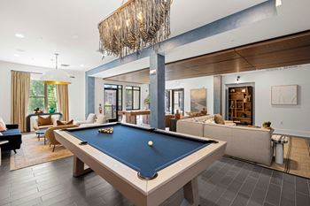 Game room with billiards and air hockey table